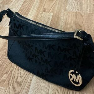 Michael Kors Black Hand Bag With Gold Colored Hardware And Adjustable Strap